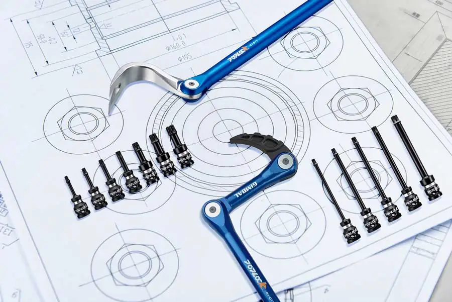 Poplock tools on architectural blueprints